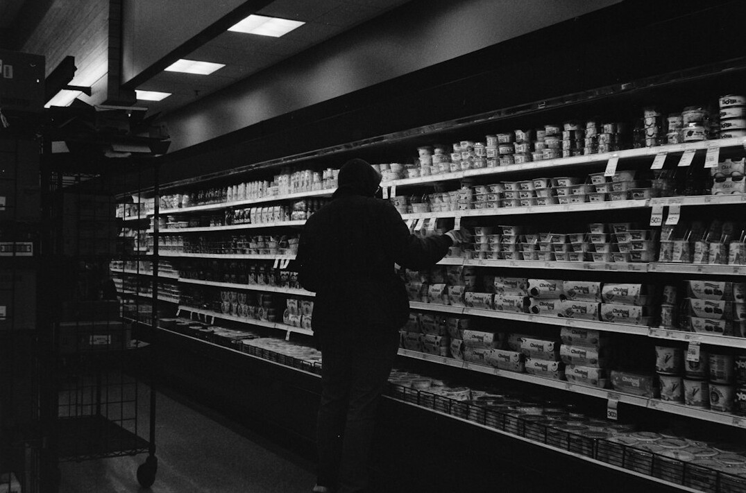 Shopping cart in a supermarket aisle